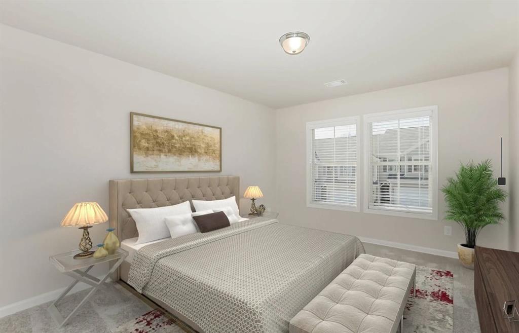 2150 Spring Rush Drive, Unit 127 Buford, GA 30519 - Photo 5 of 15 a bedroom with bed and a window