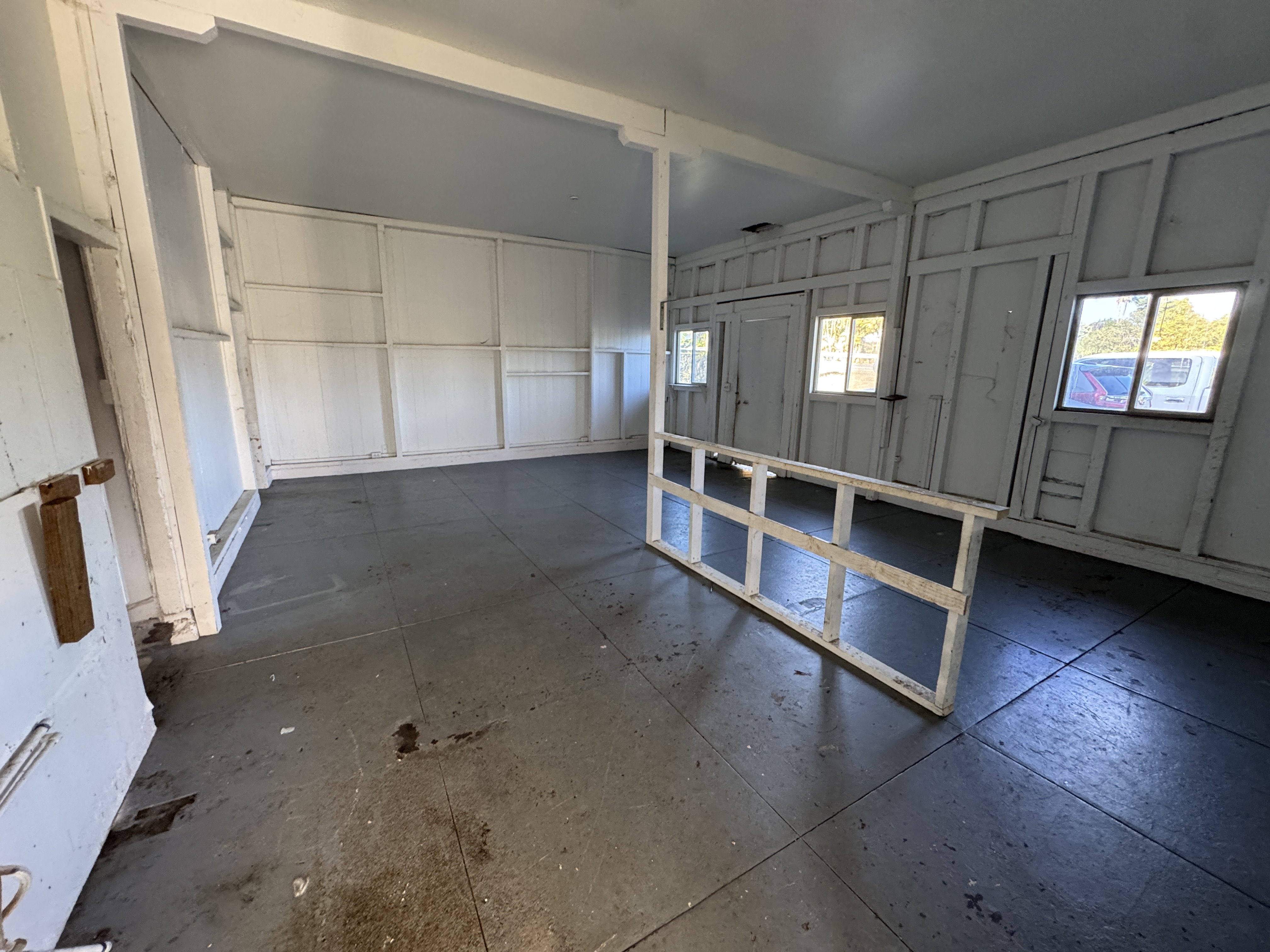 18-1253 Volcano Road Mountain View, HI 96771 - Photo 3 of 23 a view of an empty room with a window