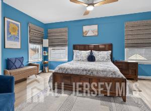 5 Scarborough Road, Unit D Monroe Township, NJ 08831 - Photo 12 of 28 a bedroom with a bed and window