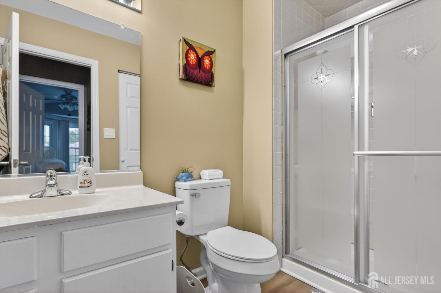 5 Scarborough Road, Unit D Monroe Township, NJ 08831 - Photo 16 of 28 a bathroom with a toilet sink and shower