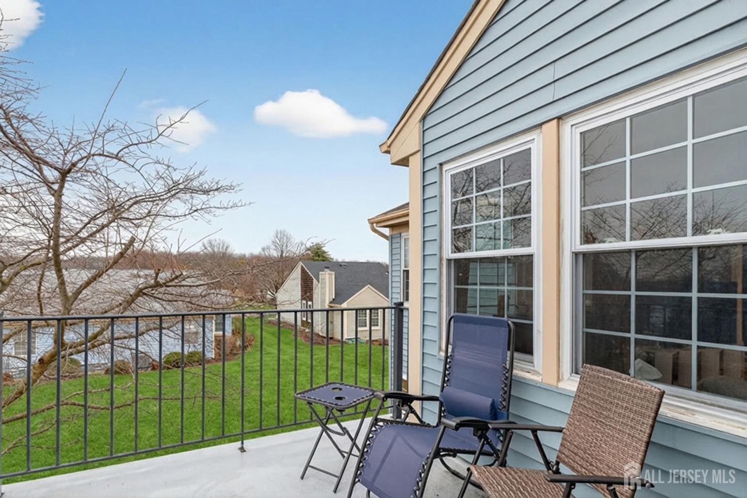 5 Scarborough Road, Unit D Monroe Township, NJ 08831 - Photo 17 of 28 a view of a house with a backyard