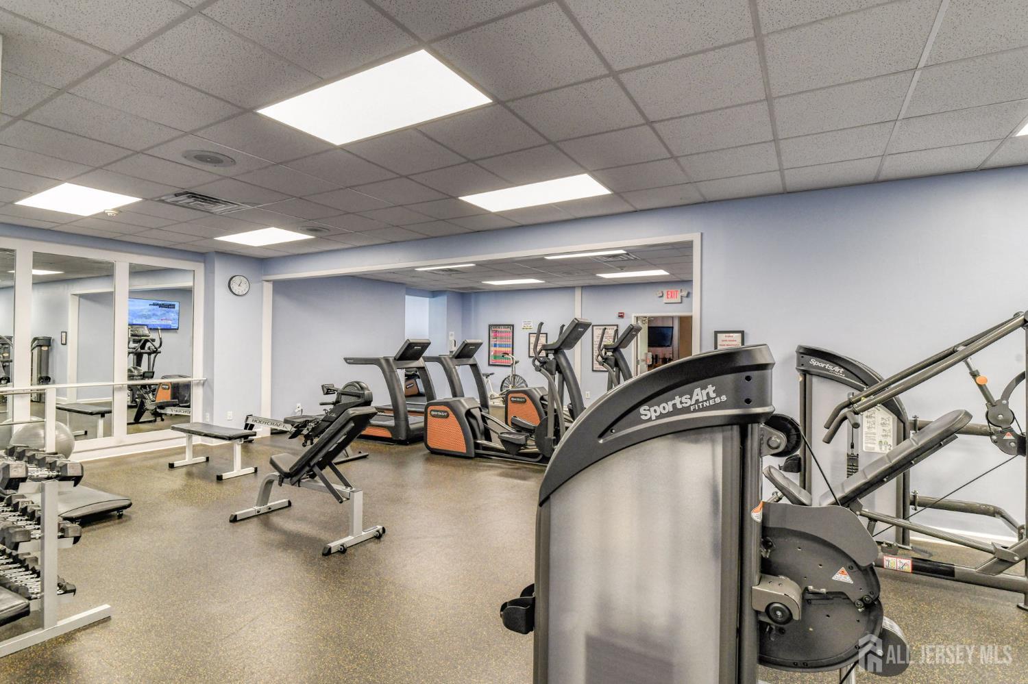 5 Scarborough Road, Unit D Monroe Township, NJ 08831 - Photo 24 of 28 a view of a room with gym equipment