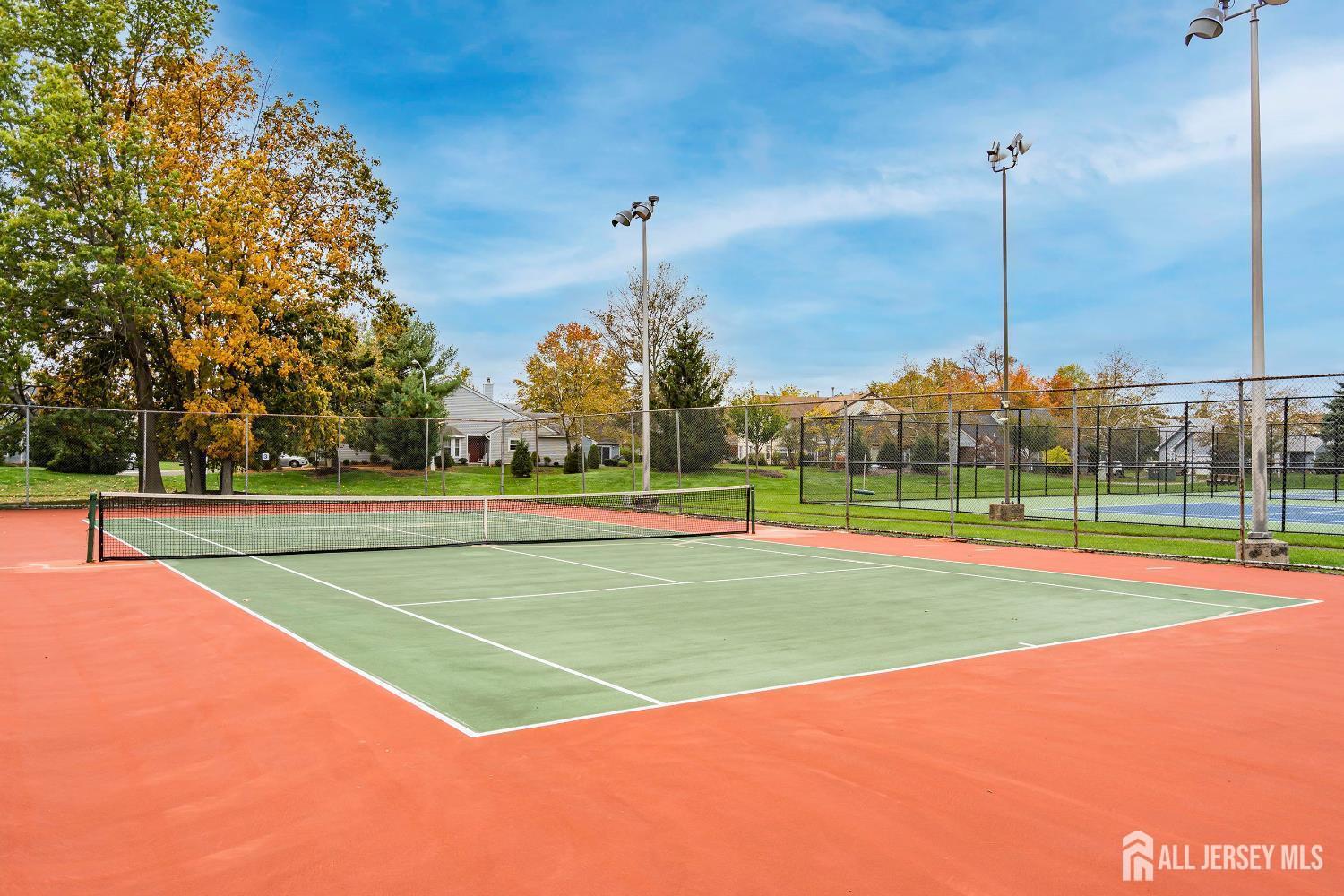 5 Scarborough Road, Unit D Monroe Township, NJ 08831 - Photo 26 of 28 a view of a tennis court