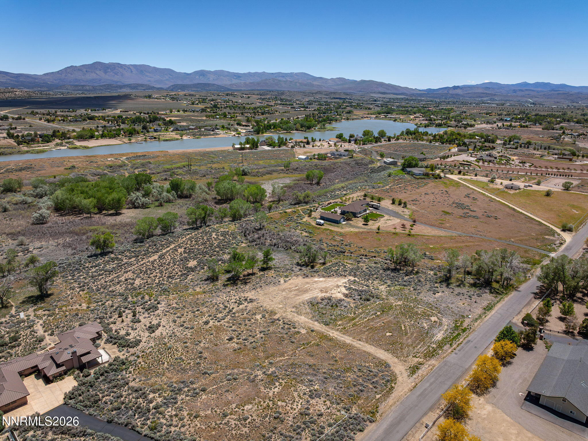 1655 Lombardy Road Gardnerville, NV 89410 - Photo 6 of 12 a view of a town with mountains in the background