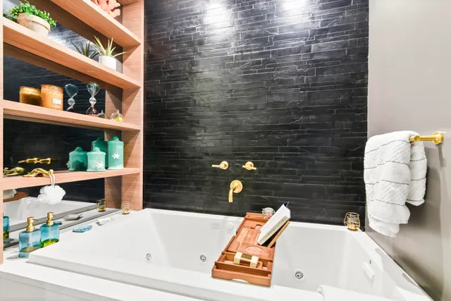 a bathroom with a bathtub and a sink