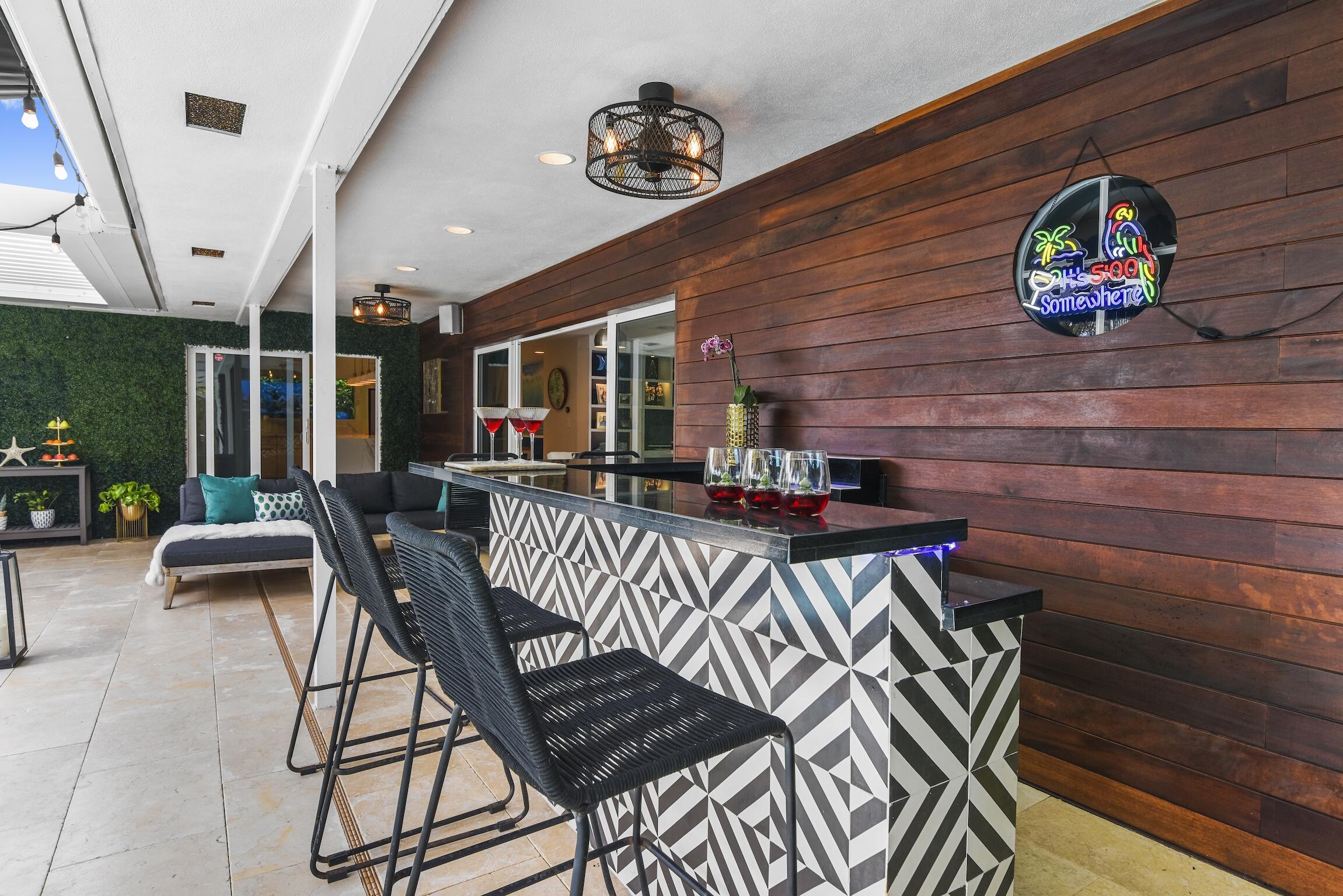 3481 Northeast 31st Avenue Lighthouse Point, FL 33064 - Photo 25 of 33 a view of a livingroom with furniture and wooden floor