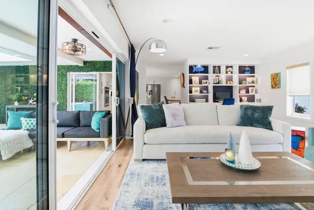 a living room with furniture and a couch