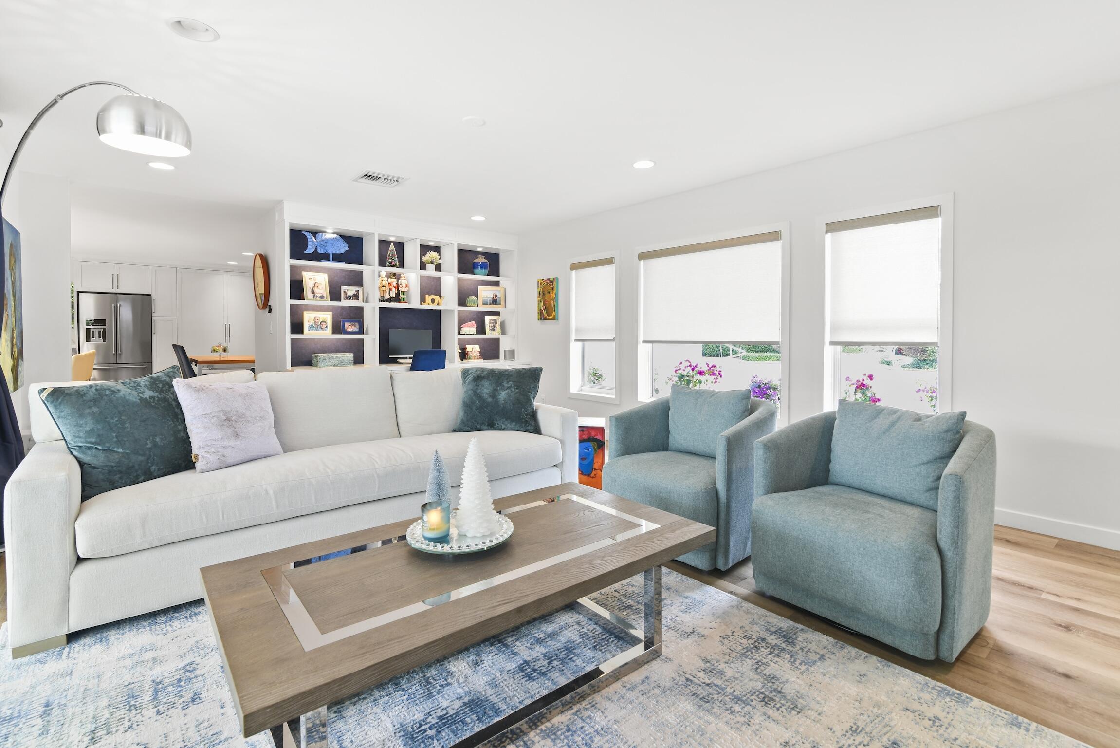 3481 Northeast 31st Avenue Lighthouse Point, FL 33064 - Photo 8 of 33 a living room with furniture and a large window