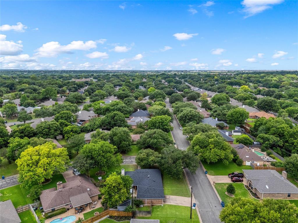 310 Ruth Drive Hewitt, TX 76643 - Photo 21 of 25 Expansive residential area featuring numerous mature trees and traditional-style homes, each with individual rooflines