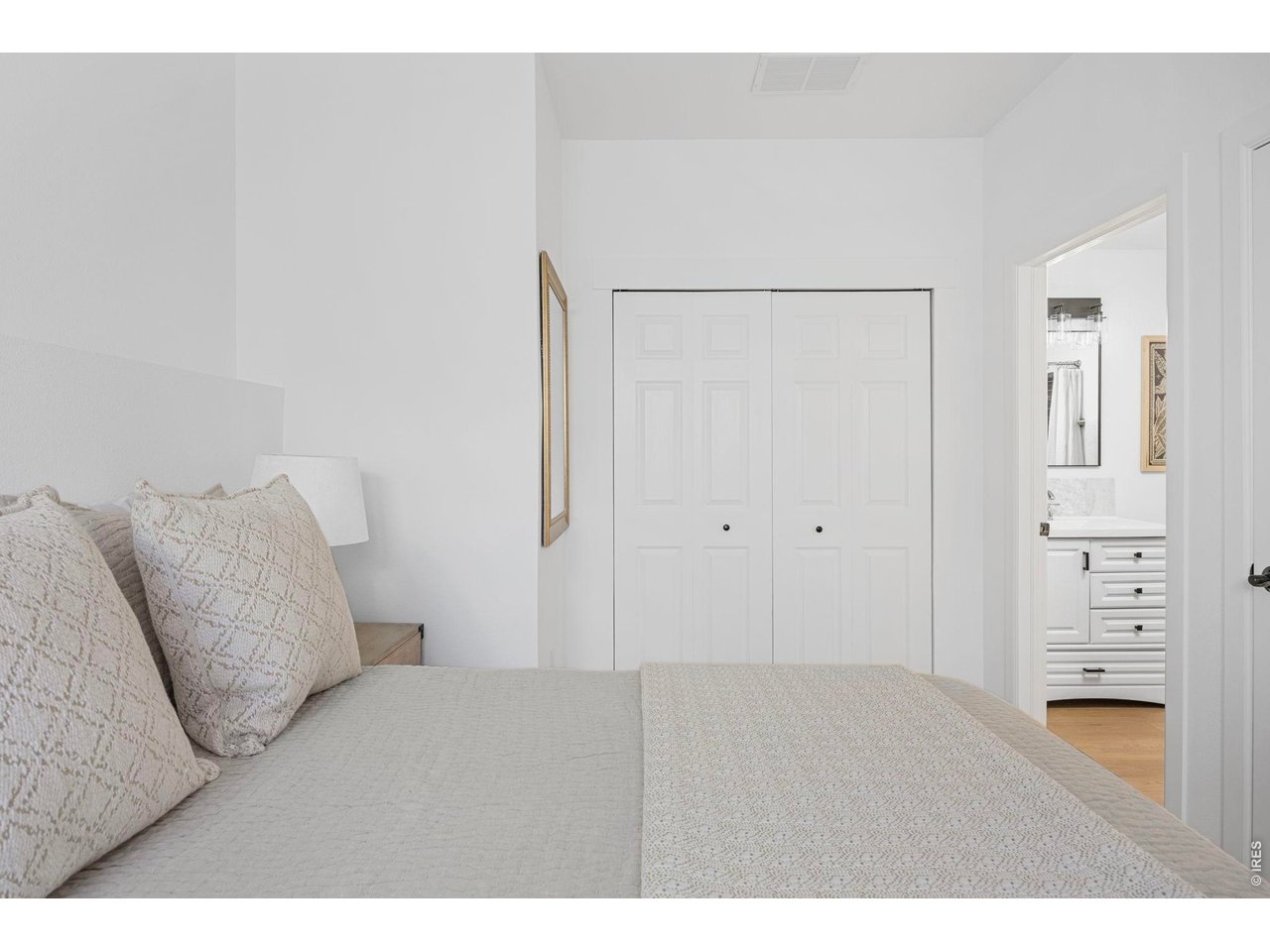 4655 13th Street Boulder, CO 80304 - Photo 15 of 23 a bedroom with a bed and a television