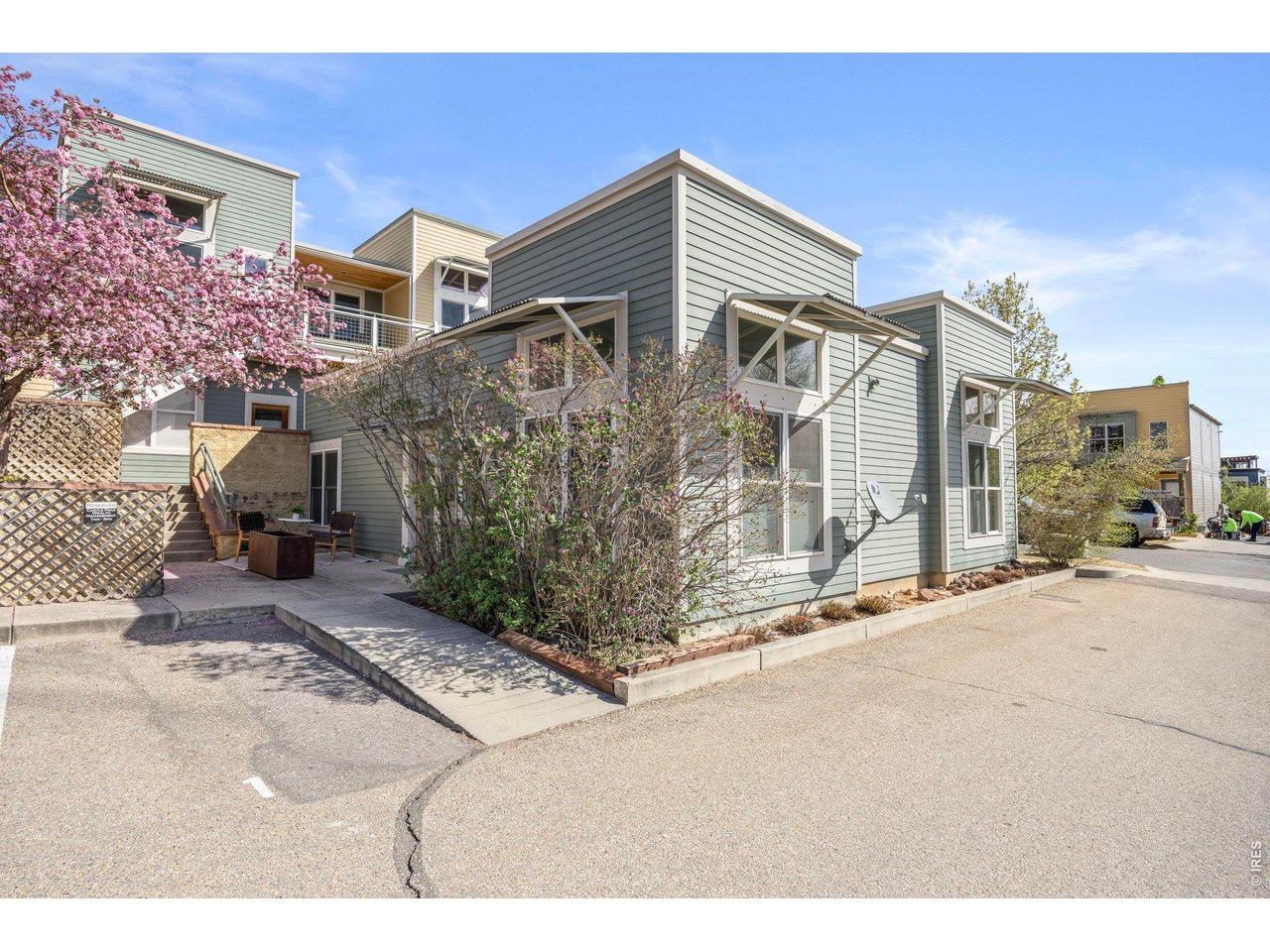 4655 13th Street Boulder, CO 80304 - Photo 2 of 23 a front view of a house with a yard