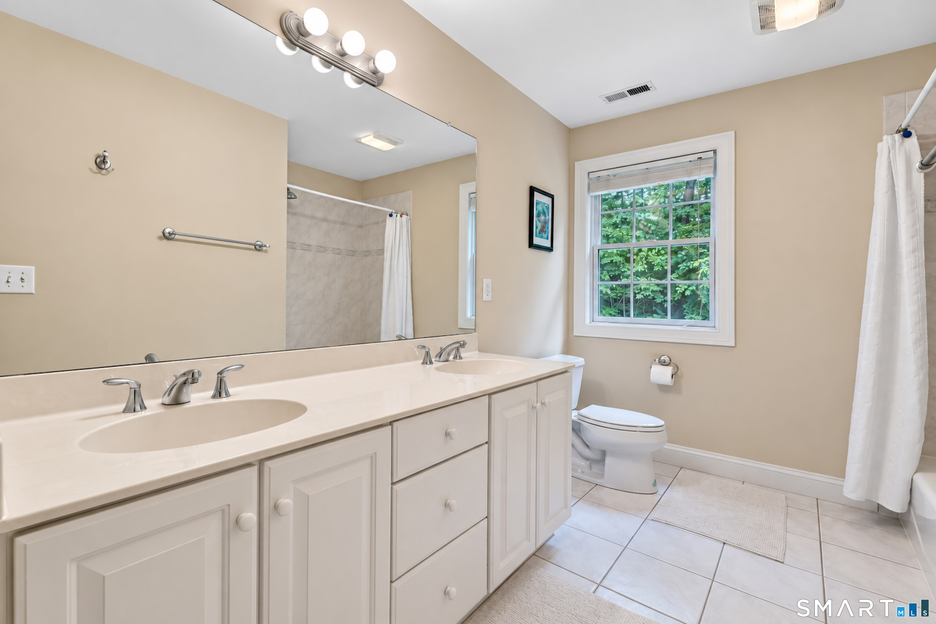 24 Judd Hill Road Bethany, CT 06524 - Photo 16 of 23 There are four full baths upstairs, and two powder rooms downstairs.