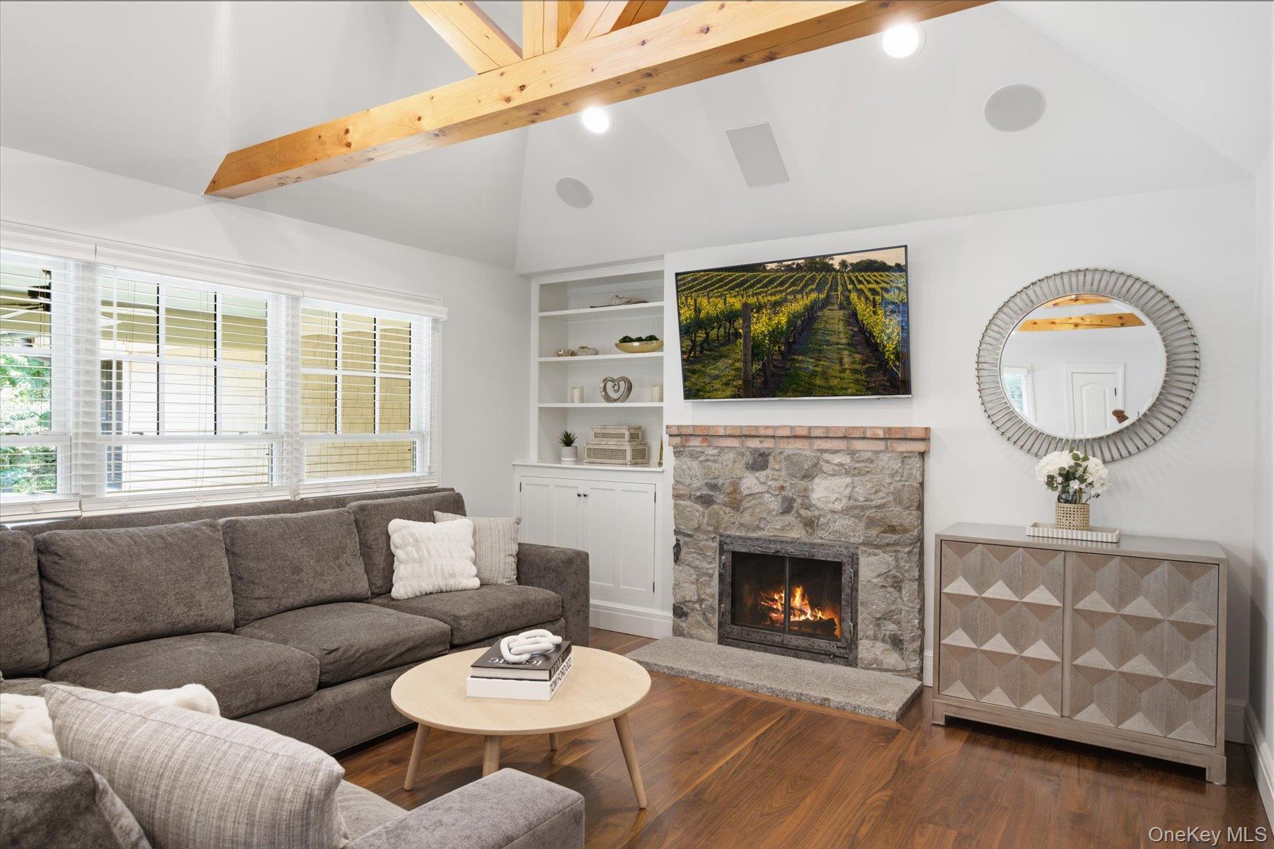 134 Sandy Hollow Road Northport, NY 11768 - Photo 8 of 28 Warm, inviting interiors finished with rich walnut flooring.
