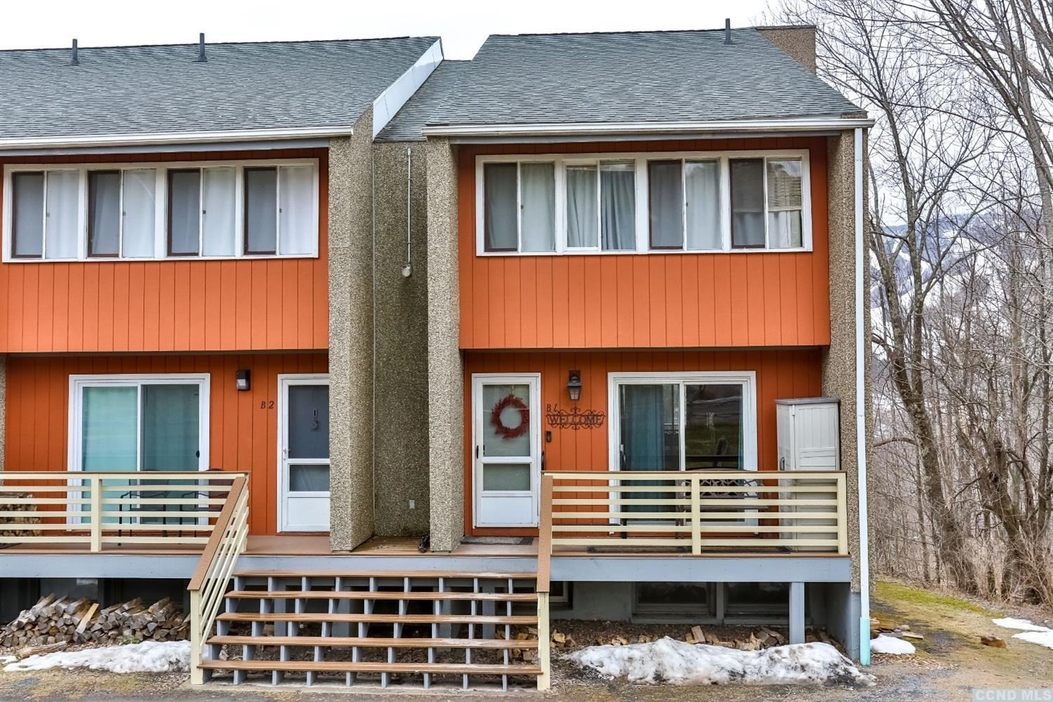 13 Scribner Hollow Road, Unit B1 Hunter, NY 12442 - Photo 3 of 37 a front view of a house with a yard