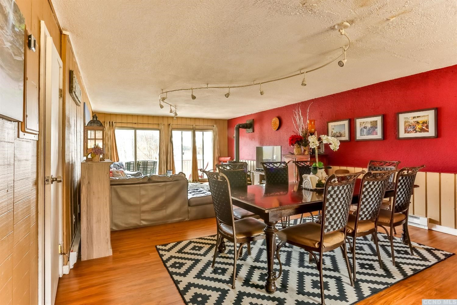 13 Scribner Hollow Road, Unit B1 Hunter, NY 12442 - Photo 5 of 37 a view of a dining room with furniture window and wooden floor