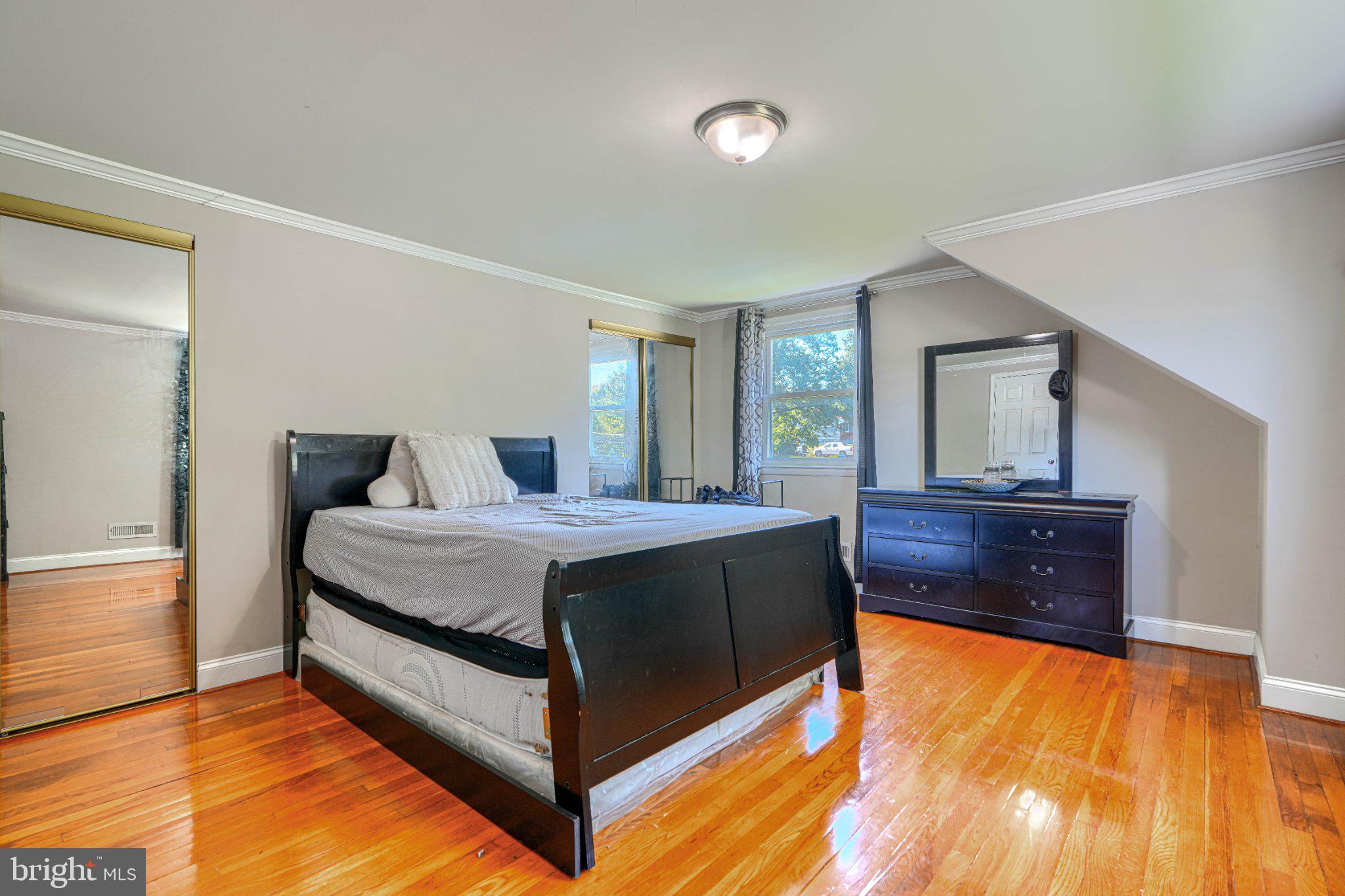 3708 Cassen Road Randallstown, MD 21133 - Photo 26 of 38 a bedroom with a bed and a dresser