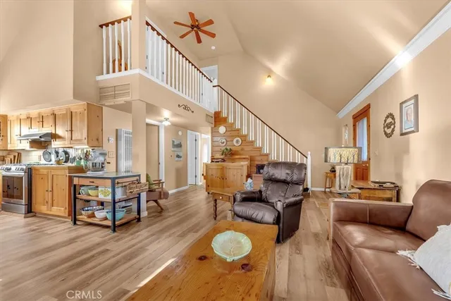 a kitchen with stainless steel appliances granite countertop a stove and more cabinets