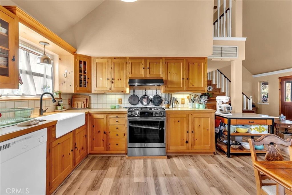 18810 Phyllis Road Cottonwood, CA 96022 - Photo 16 of 71 a kitchen with stainless steel appliances granite countertop a stove and more cabinets