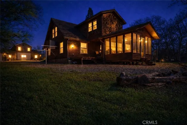 a backyard of a house with lots of green space