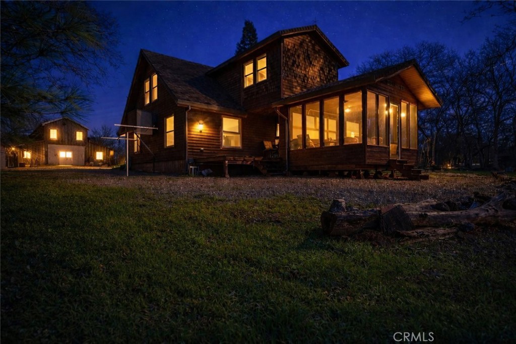 18810 Phyllis Road Cottonwood, CA 96022 - Photo 3 of 71 a backyard of a house with lots of green space