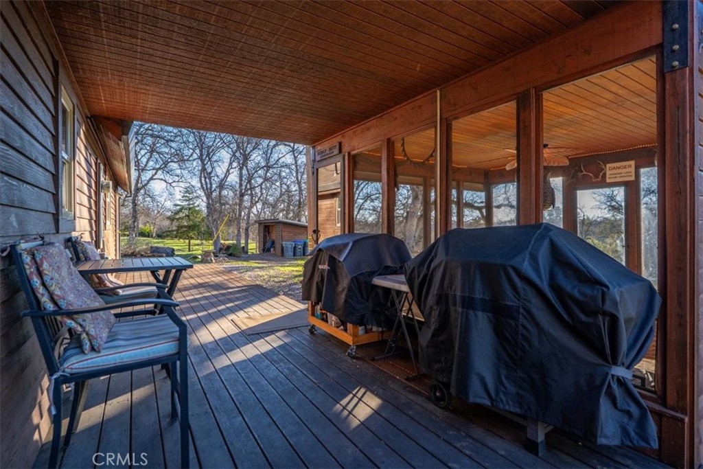 18810 Phyllis Road Cottonwood, CA 96022 - Photo 59 of 71 a view of balcony with furniture and wooden floors