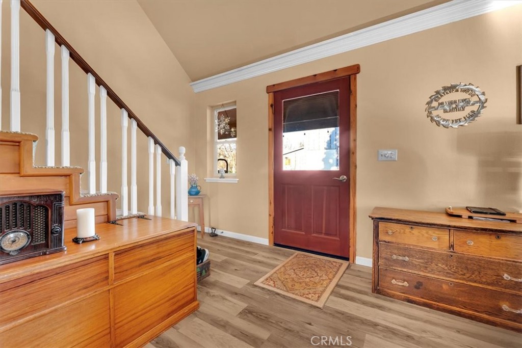 18810 Phyllis Road Cottonwood, CA 96022 - Photo 6 of 71 a view of an entryway with wooden floor and a front door