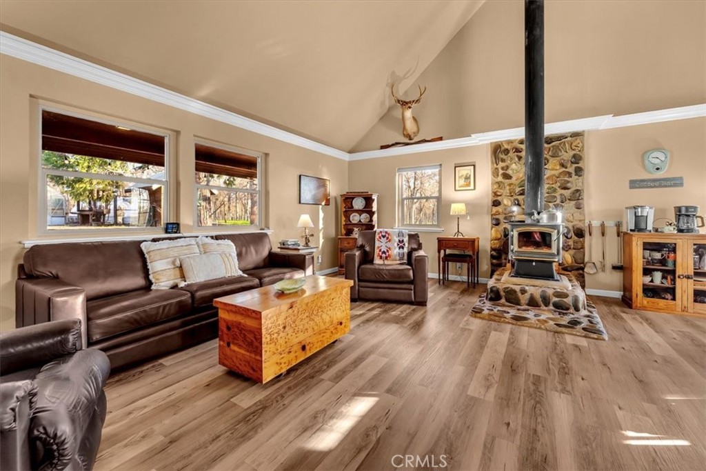18810 Phyllis Road Cottonwood, CA 96022 - Photo 7 of 71 a living room with furniture and a large window