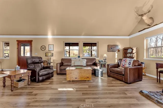 a large open kitchen with a table and chairs