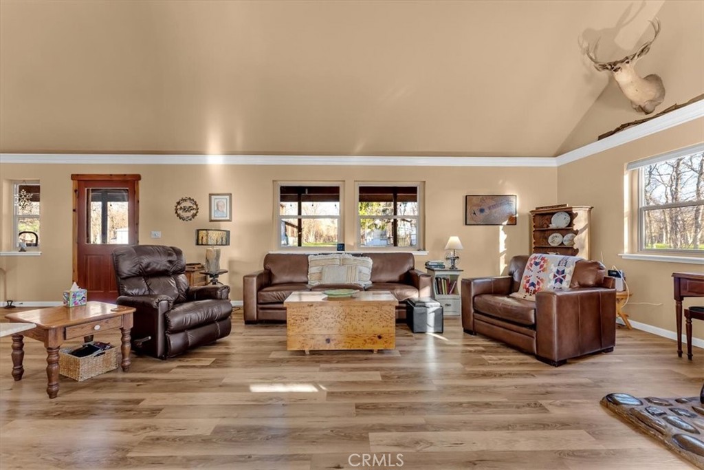 18810 Phyllis Road Cottonwood, CA 96022 - Photo 10 of 71 a living room with furniture and a wooden floor