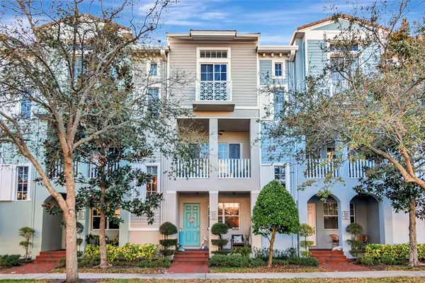 a view of a room that has a table and a chair