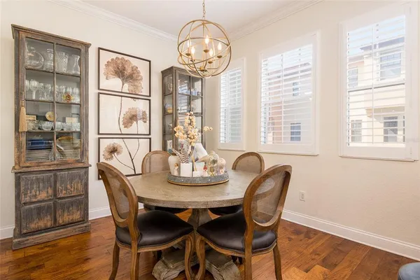 a view of a chairs and table in patio
