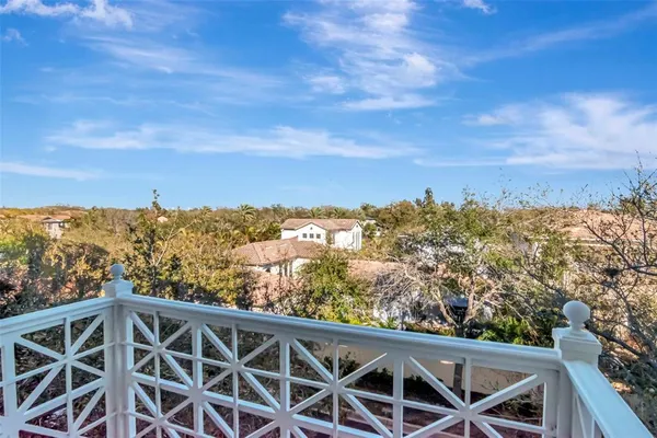 an aerial view of a city with lawn chairs