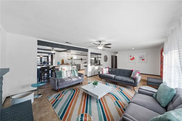 a bedroom with a bed and a fireplace
