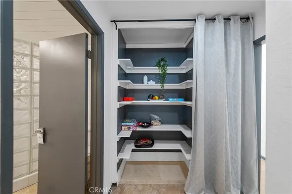 a view of room with gym equipment
