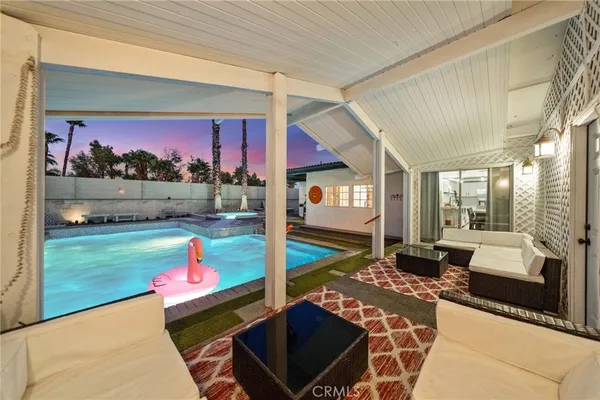 a view of a house with swimming pool