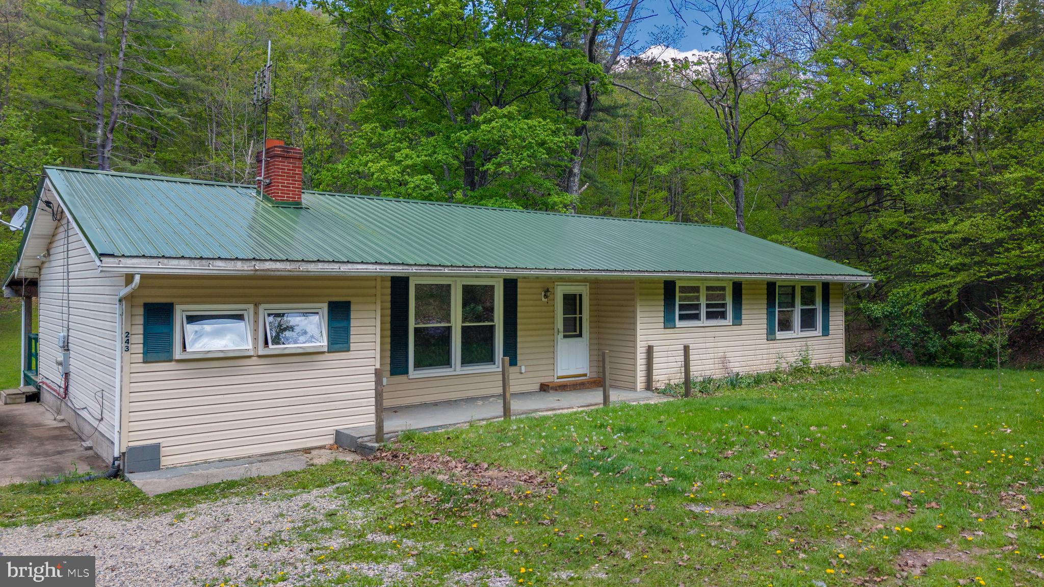 243 Lucas Road Bellefonte, PA 16823 - Photo 2 of 32 a view of a house with a yard