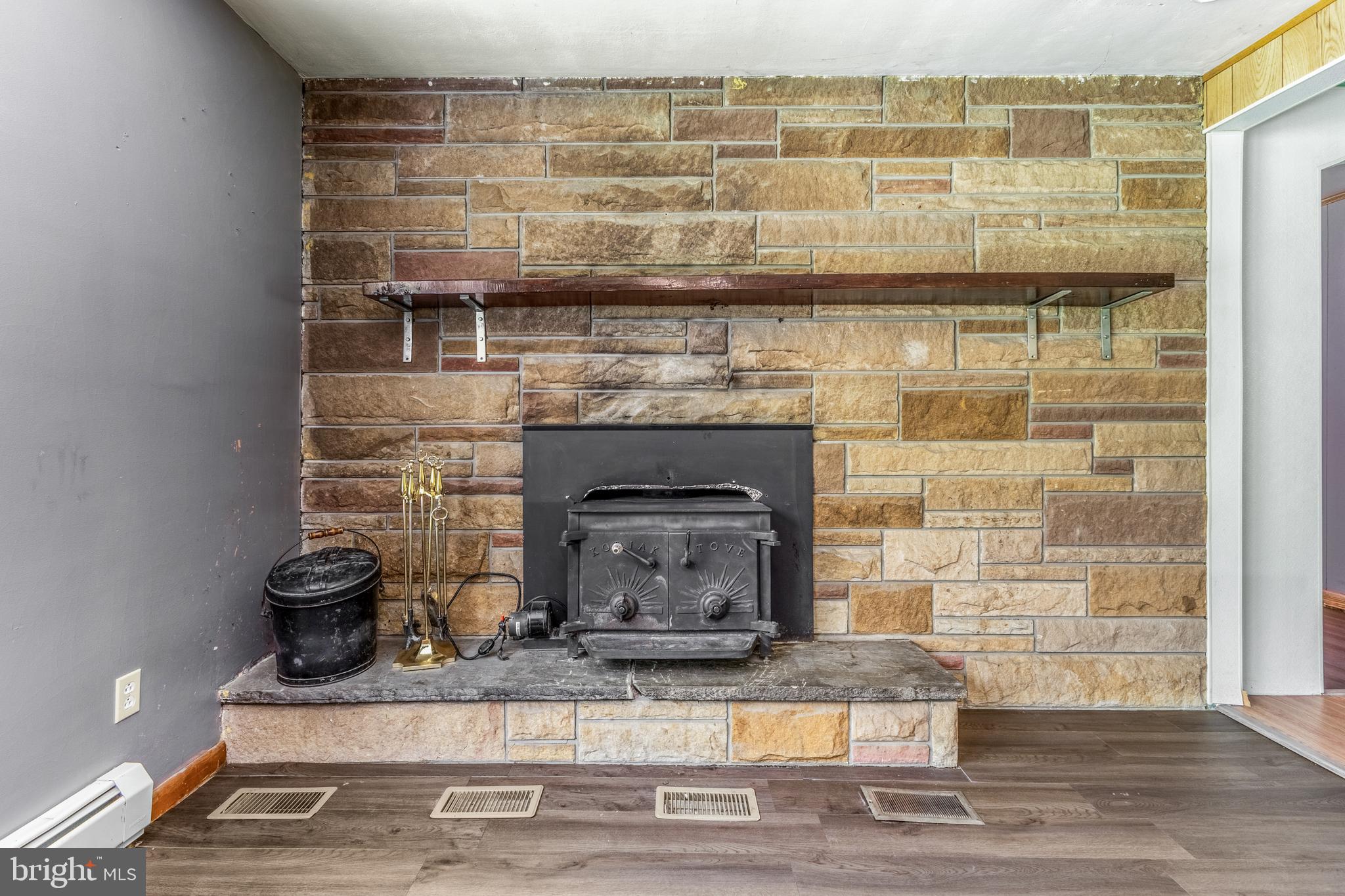 243 Lucas Road Bellefonte, PA 16823 - Photo 6 of 32 a room with fireplace
