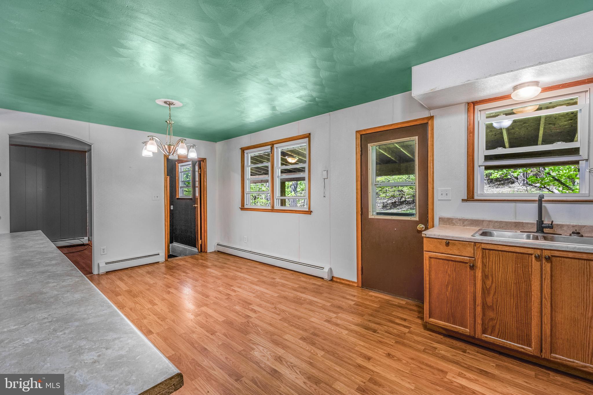 243 Lucas Road Bellefonte, PA 16823 - Photo 9 of 32 wooden floor in an empty room with a window