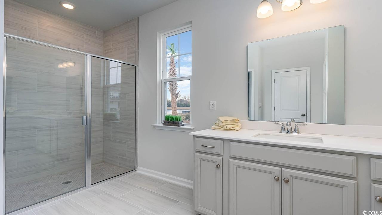 117 Keithland Drive Conway, SC 29527 - Photo 16 of 32 Bathroom with vanity and a shower stall