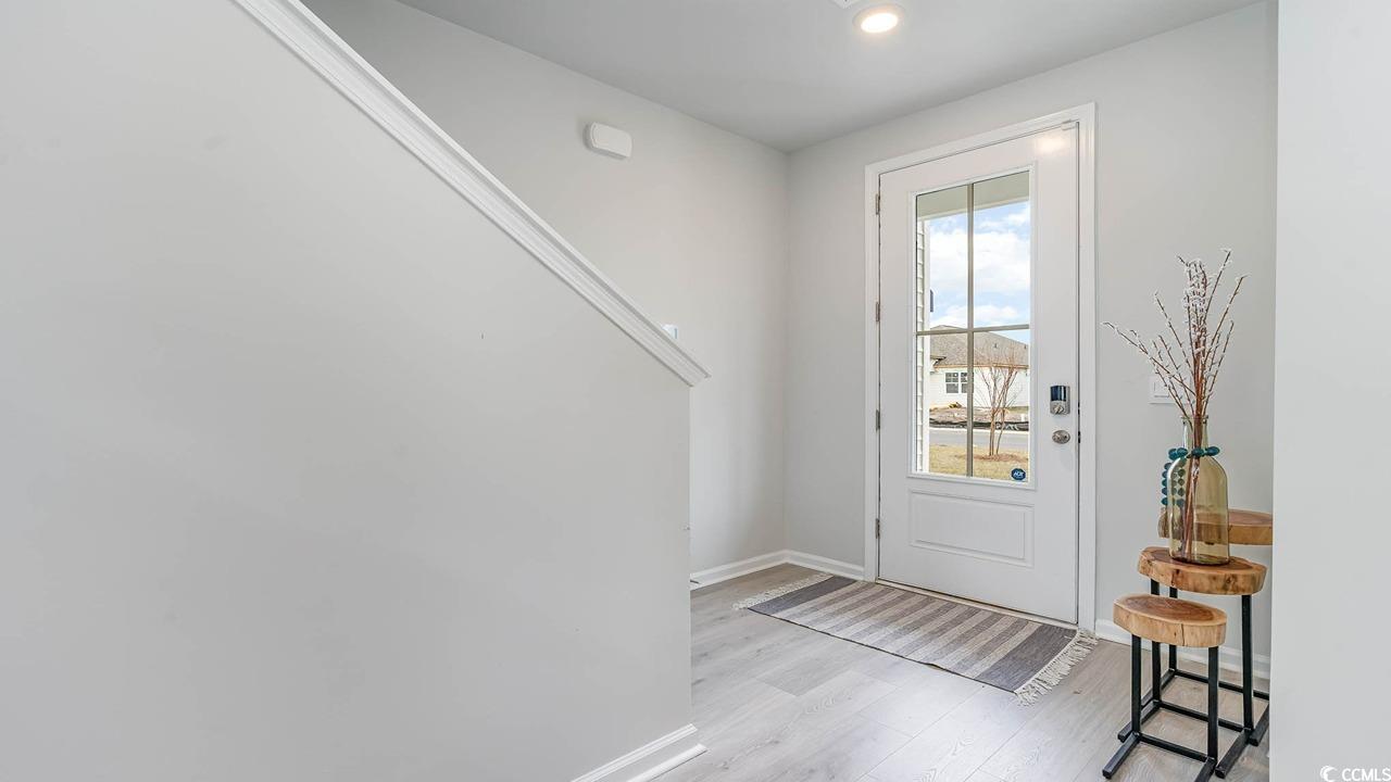 117 Keithland Drive Conway, SC 29527 - Photo 2 of 32 Doorway with light wood-style floors and recessed lighting