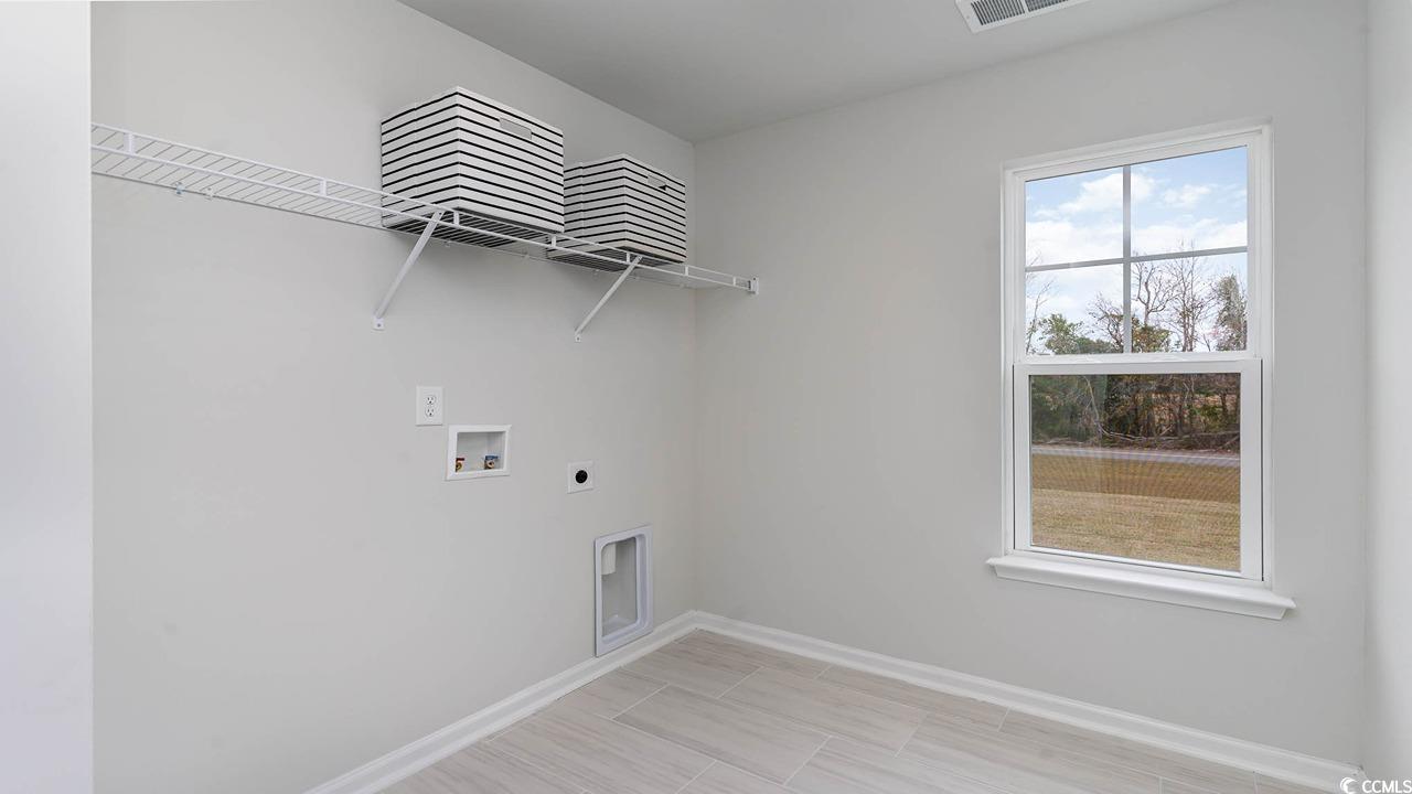 117 Keithland Drive Conway, SC 29527 - Photo 27 of 32 Laundry area with hookup for an electric dryer and washer hookup