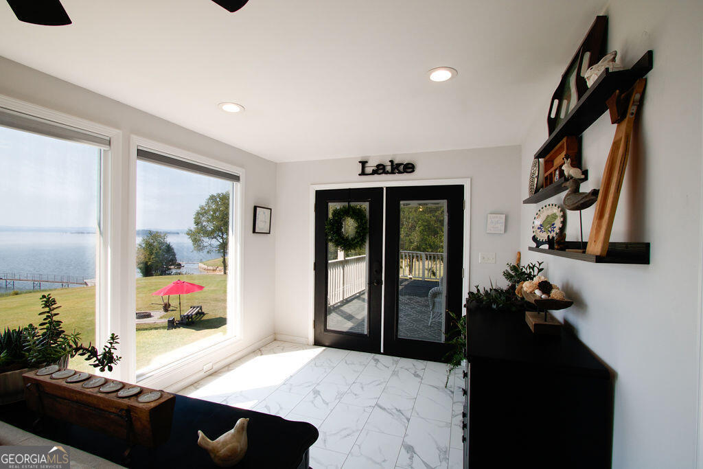 81 Docks Hook Lane Georgetown, GA 39854 - Photo 14 of 33 a living room with furniture and a flat screen tv