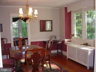 434 Strathmore Road Havertown, PA 19083 - Photo 2 of 6 a view of a dining room with furniture and chandelier