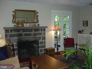 434 Strathmore Road Havertown, PA 19083 - Photo 5 of 6 a living room with furniture and a fireplace