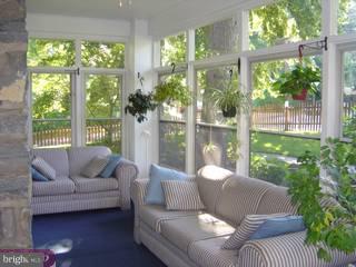 434 Strathmore Road Havertown, PA 19083 - Photo 6 of 6 a living room with furniture and a potted plant