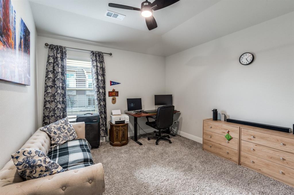 825 Heart Reef Road Plano, TX 75075 - Photo 5 of 12 Office area featuring light carpet, ceiling fan, and vaulted ceiling