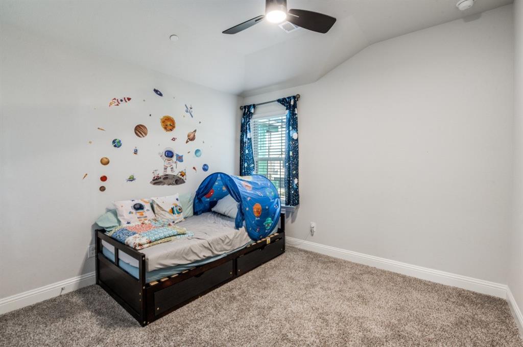 825 Heart Reef Road Plano, TX 75075 - Photo 6 of 12 Bedroom with carpet flooring, a ceiling fan, and lofted ceiling