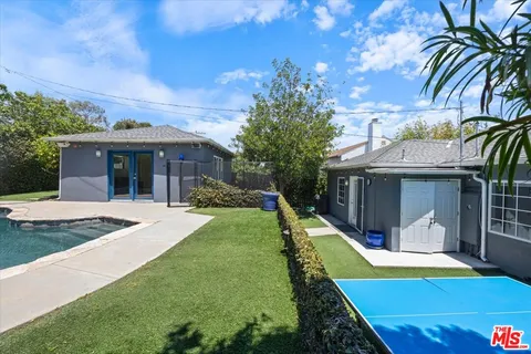 a view of a house with swimming pool