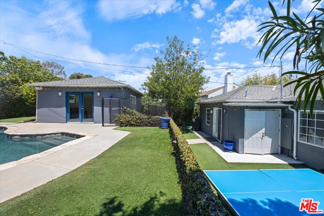 14041 Roblar Road Sherman Oaks, CA 91423 - Photo 40 of 47 a view of a house with swimming pool
