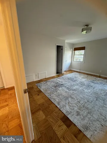 a view of empty room with front door